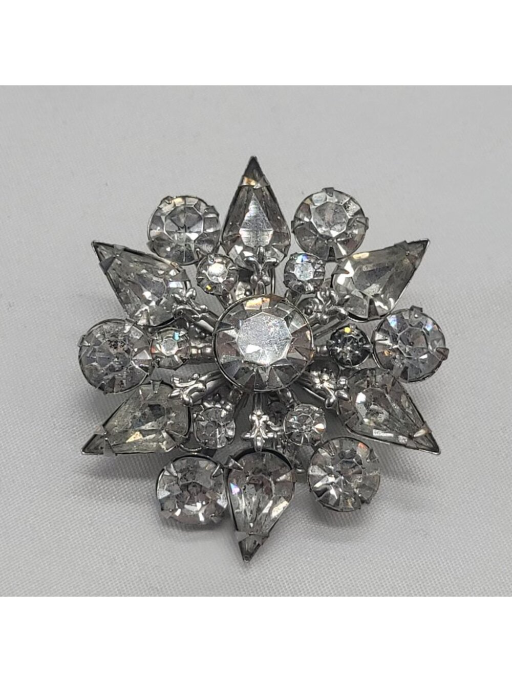 Vtg Rhinestone Starburst Brooch Clear Stones & Silver-Tone Setting 2"